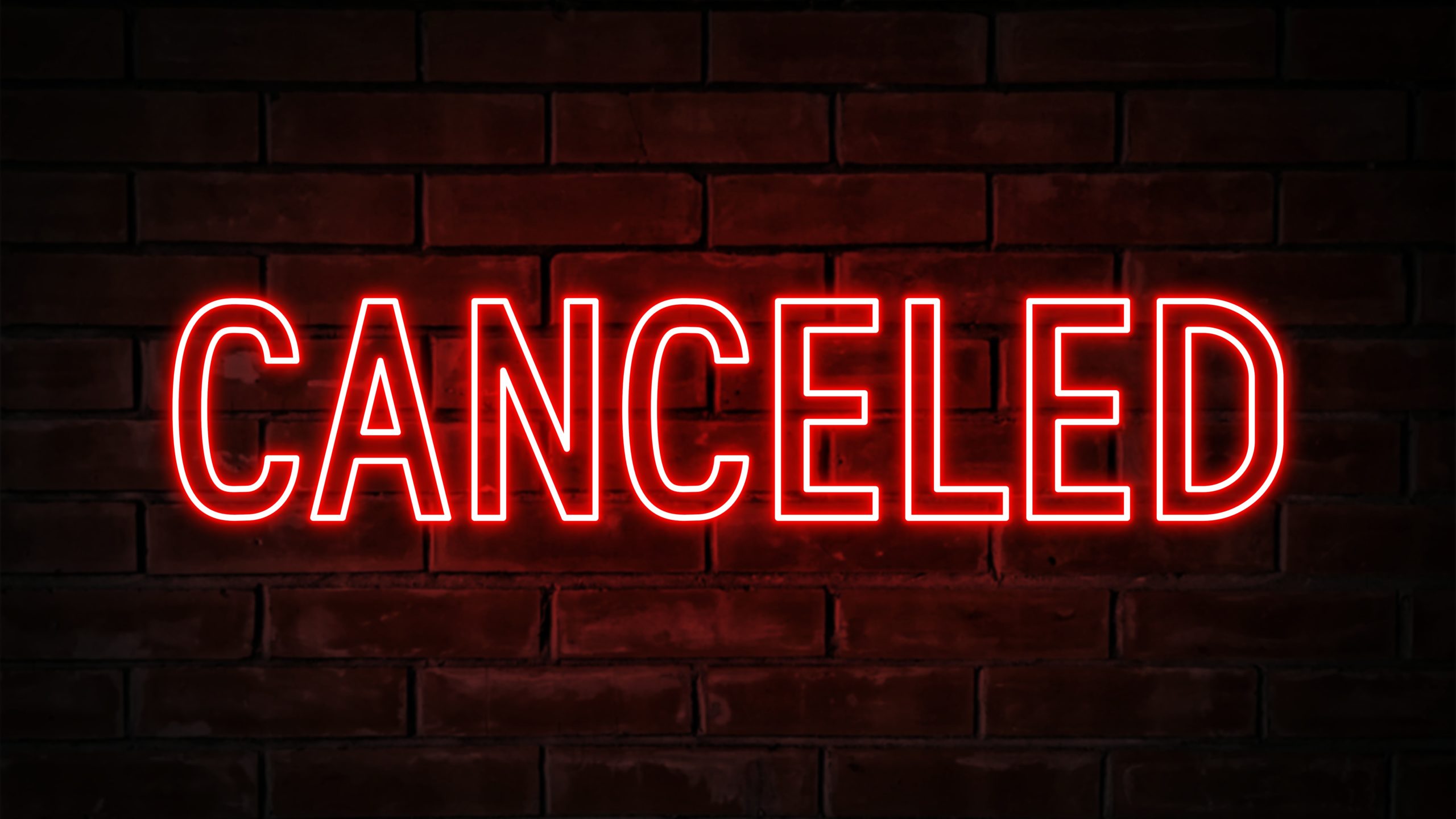 canceled red neon light word on brick wall backg 2021 10 19 15 30 18 utc